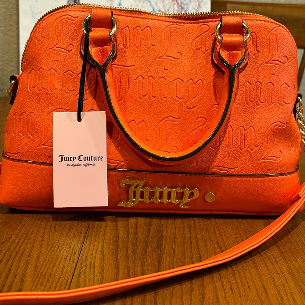 NWT JUICY COUTURE DOME SATCHEL WITH A CROSSBODY. Color is Deboss orange red.
